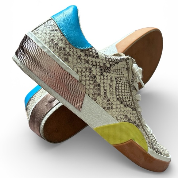 DOLCE VITA Zina Sneaker In Bone MultiSnake Print Leather.
Women’s Sz 7 - Picture 6 of 7